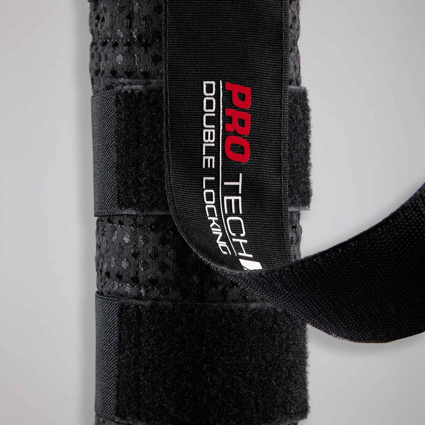 Protège-queue matelassé en nid d’abeille Premier Equine avec double fermeture Velcro